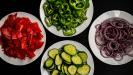rustic greek “choriatiki” salad slices on flatbread rusks