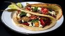 roasted vegetable tacos with refried chickpea purée & crumbled feta cheese