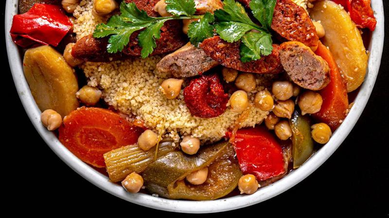 couscous with stewed vegetables & grilled sausages