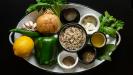 chicken thighs & rice pilaf casserole with lemon & oregano & green peppers