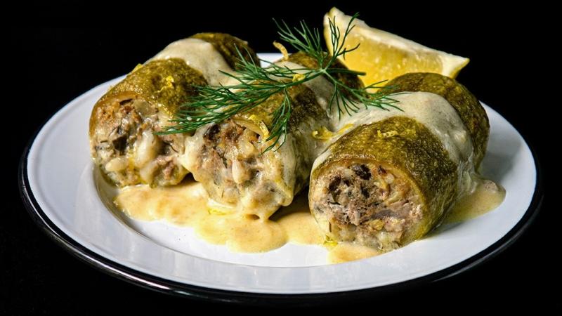 greek-style stuffed zucchini with egg & lemon sauce
